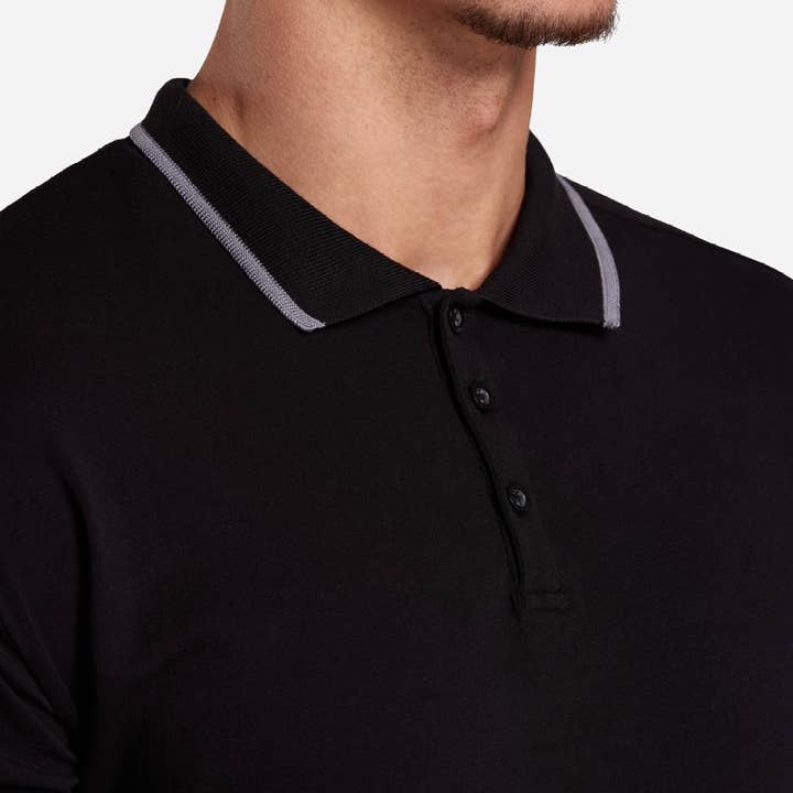 Dusan Polo Shirt - Black with Branded Overarm Tape for wholesale on Faire