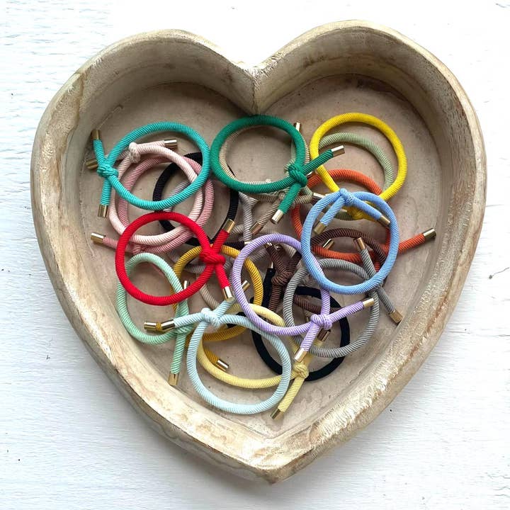 Tied Hair & Wrist Band (Various Colours) and other Purchase wholesale elastic bands. Free returns & net 60 terms on Faire trending on Faire.