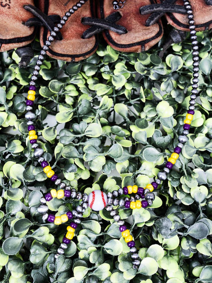 Collier nœud de baseball violet et jaune TIPI pour la vente par Wholesale Accessory Market