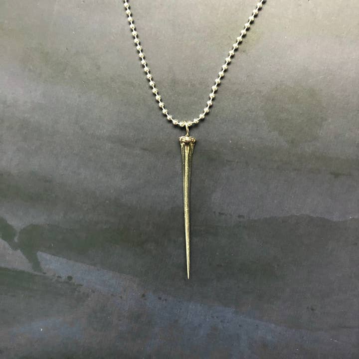 Mini Horseshoe Crab Tail Necklace for wholesale by Tidal Pool Brooklyn