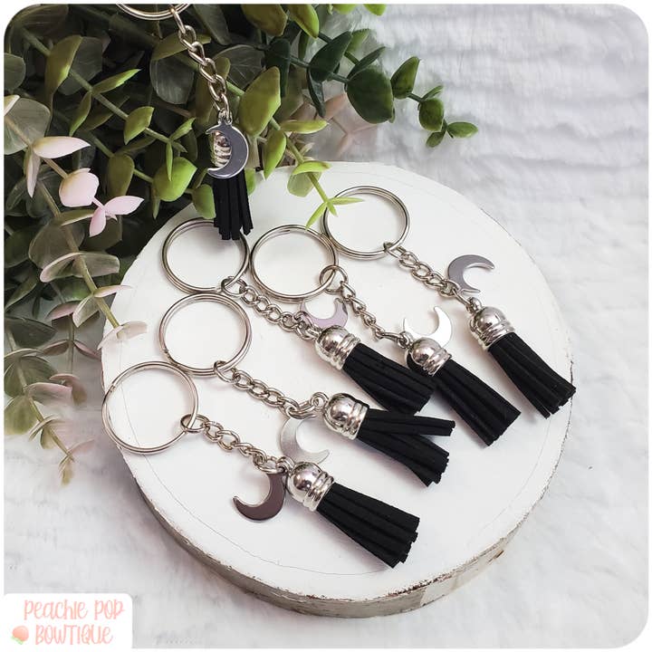 Black Tassel Moon Witch Keychains for wholesale by Foxglove and Sage