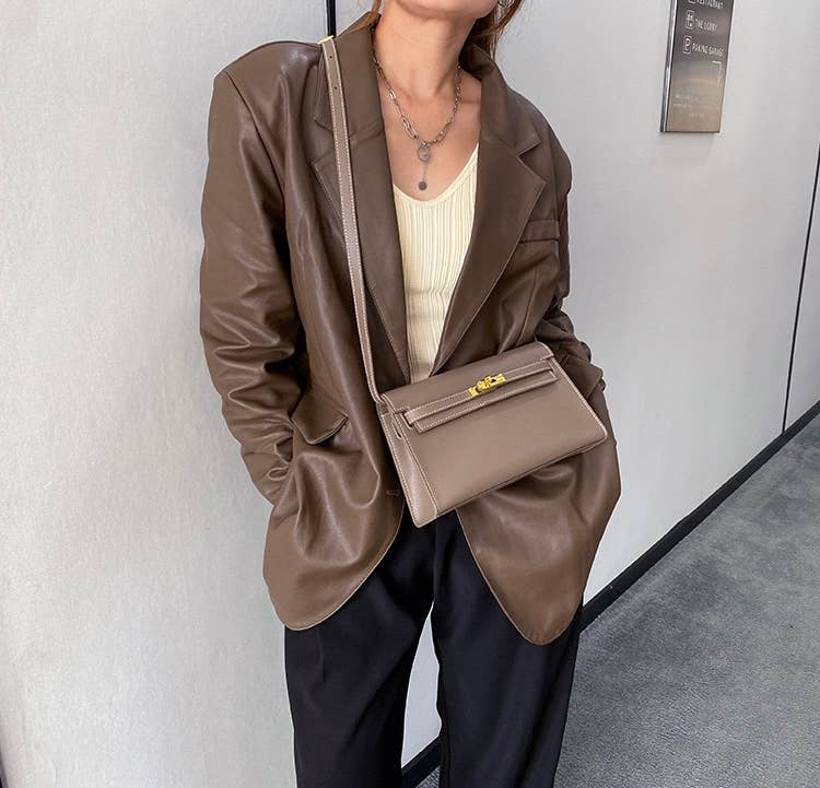 Sook Stainable - Vendita all'ingrosso Tracolla - Donna - Borsa a tracolla a busta in vera pelle con chiusura metallica14