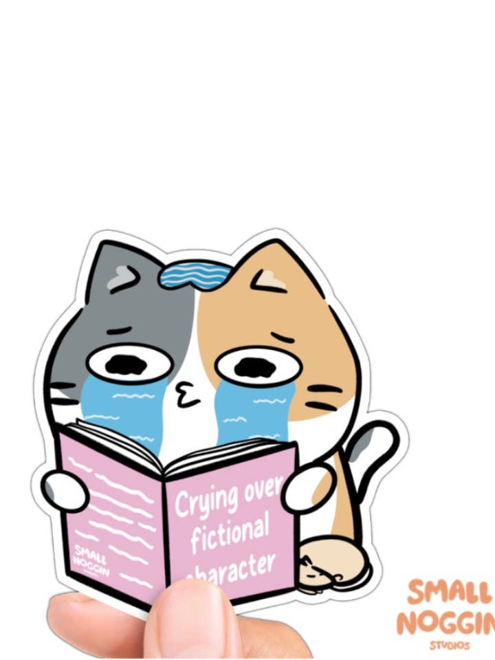 Græder over fiktiv karakter kat læser vinylklistermærke for engroshandel hos Small Noggin Studios