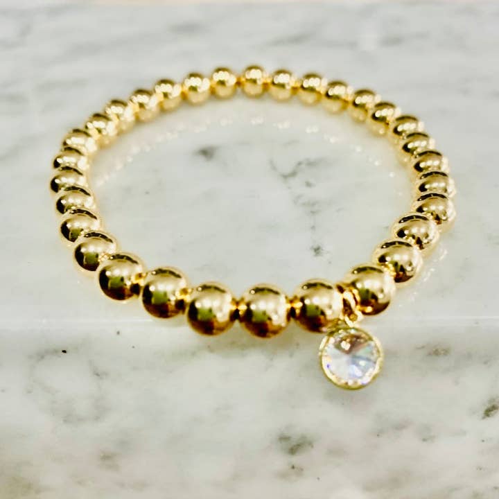 Pärlband ”CZ Bezel Charm” för wholesale av Kelly and Rose Boutique