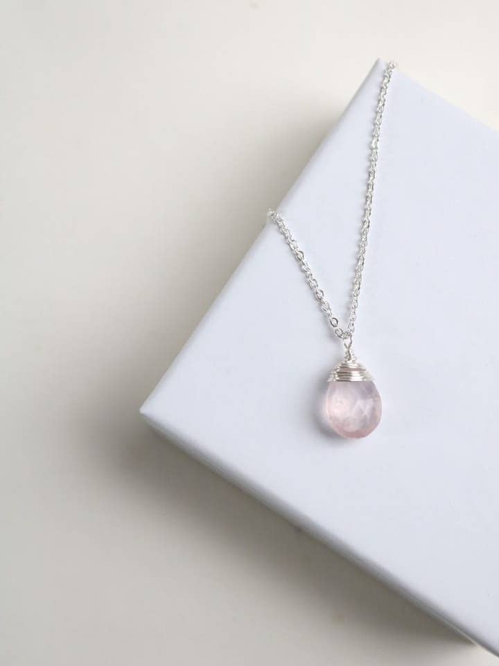 Small rose quartz pendant on silver chain women's jewelry for wholesale by Positiva Jewelry