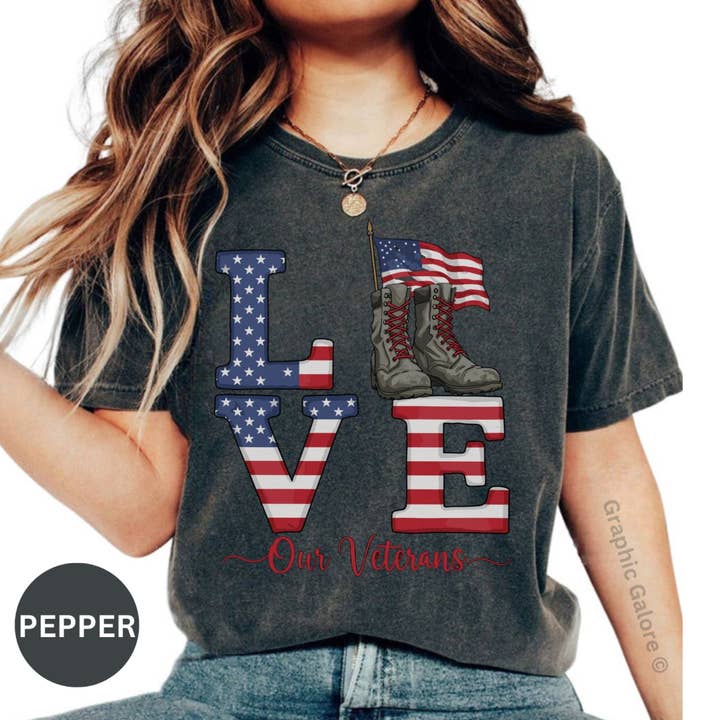 Love Our Veterans T-Shirt, Military Boots Tee, Patriotic Flag USA Shirt, Gift for Veterans Day, US Pride Apparel for wholesale by Graphic Galore