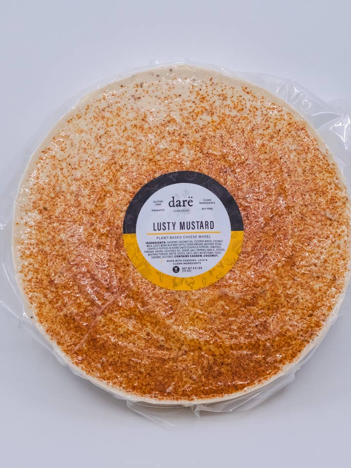 Lusty Mustard Plant-Based Cheese Wheel for wholesale by Darë Vegan Cheese