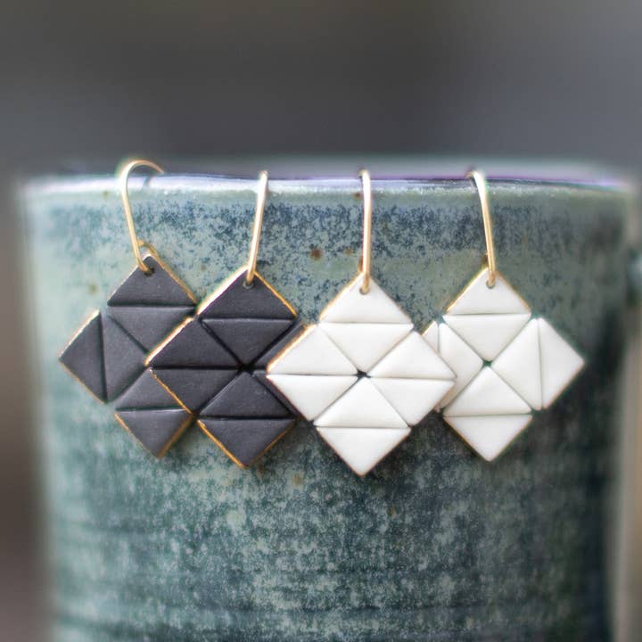 white and black square tile studs for wholesale by Remnant Studios