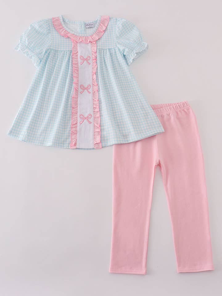 Blue bow embroidery gingham ruffle pants set and other Purchase Wholesale blue gingham top. Free Returns & Net 60 Terms on Faire trending on Faire.