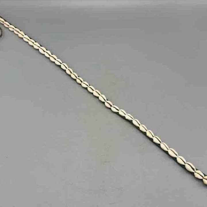 The Niger Bend – Großhandel Gürtel – Damen – Schmaler afrikanischer Krawattenverschluss aus echtem Kaurimuschelleder16