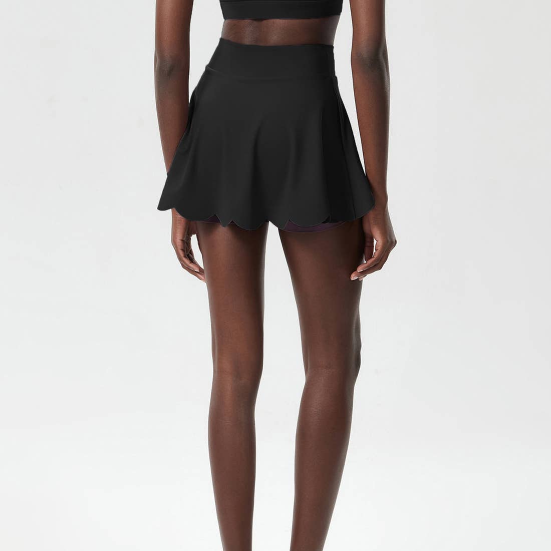 Sodalemon – wholesale Sportkjol – Dam – Sodalemon snabb­torkande tenniskjol i Lycra för kvinnor med vågmönster och A-linjeform1