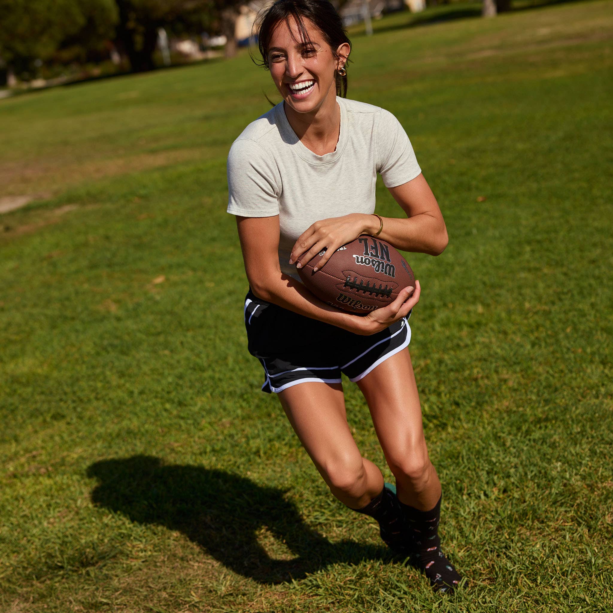 Conscious Step - Wholesale Socks - Unisex - Socks that Support Youth Sports (Black Footballs)5