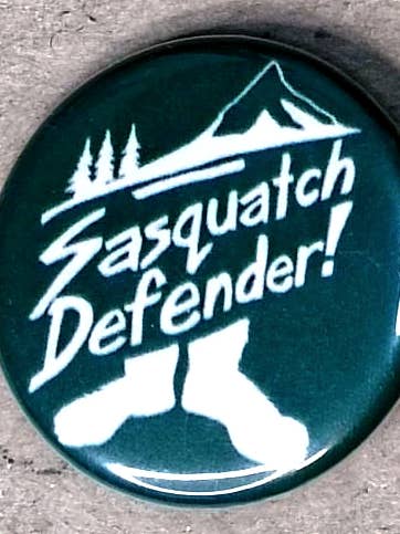 Sasquatch Defender pin-back button for wholesale by Partly Robot Industries