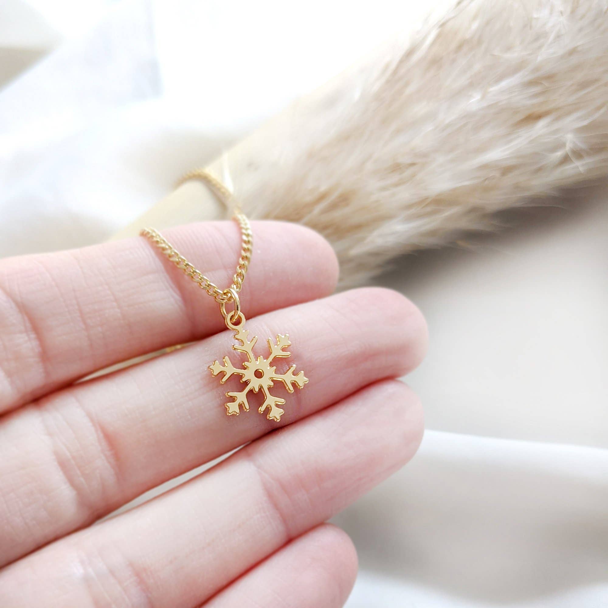 Gold snowflake sale charm