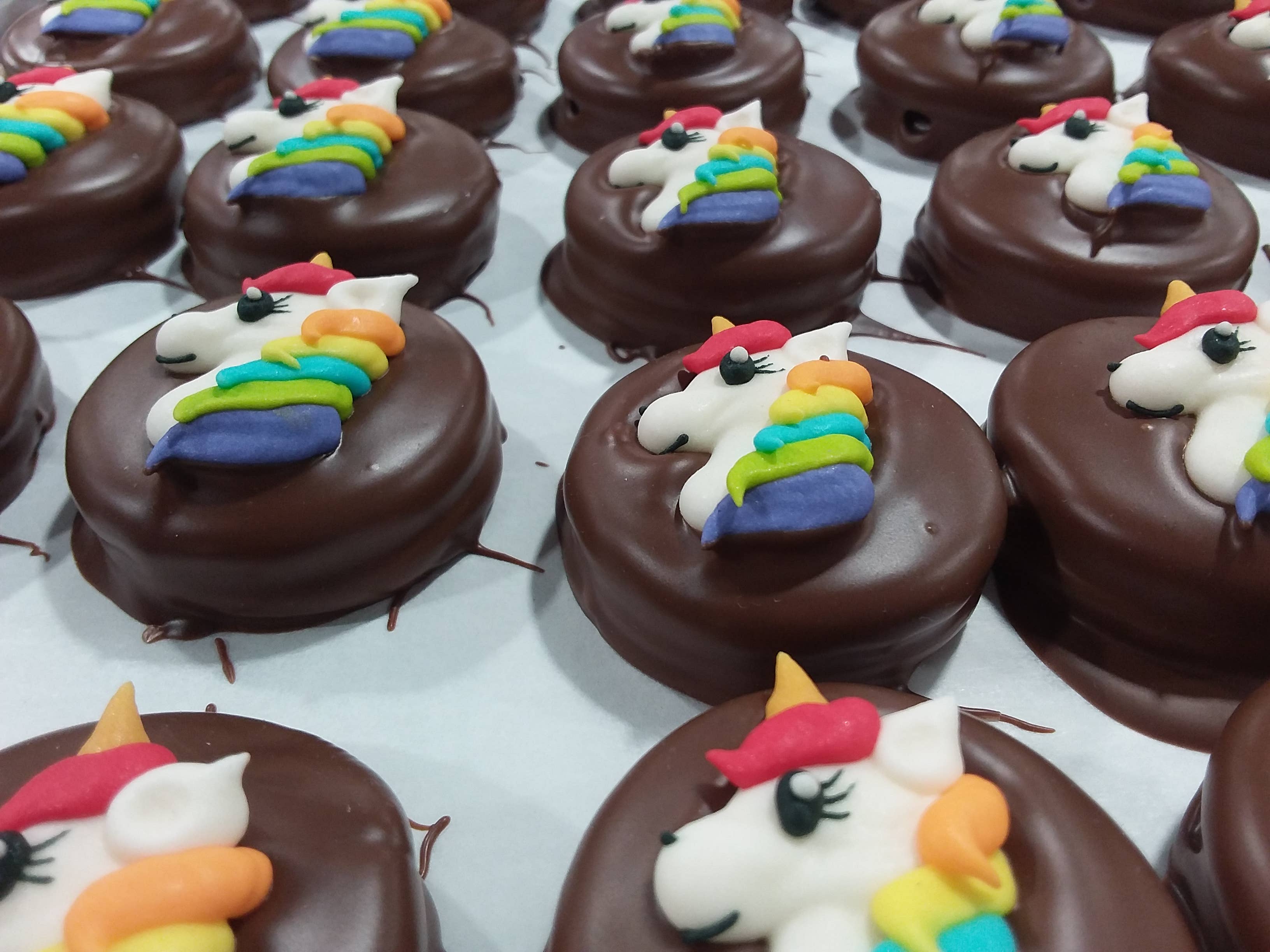 Bear Creek Candy Kitchen - Wholesale Chocolate Covered Sweets - 🍪Milk Chocolate Oreo “Rainbow Unicorn Head” 🦄 Chocolate Covered Oreo 🌍"Bumble Bee's"  Box of 243