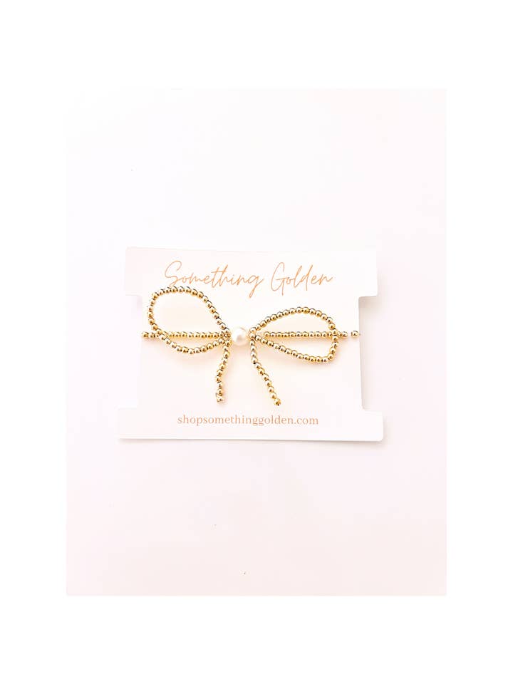 Il Braccialetto Perline e Fiocco per la vendita all'ingrosso da parte di Something Golden