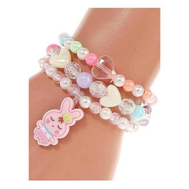 Ensemble de bracelets extensibles avec perles et lapin pour la vente par Atlas Fashion