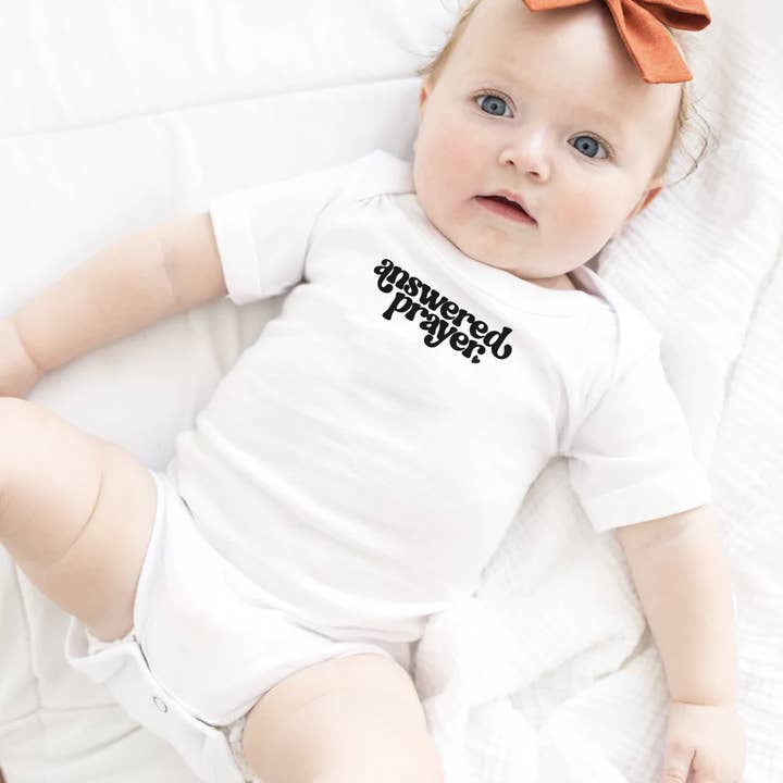 Answered Prayer Baby Onesie for wholesale by 6Heart Collective, LLC