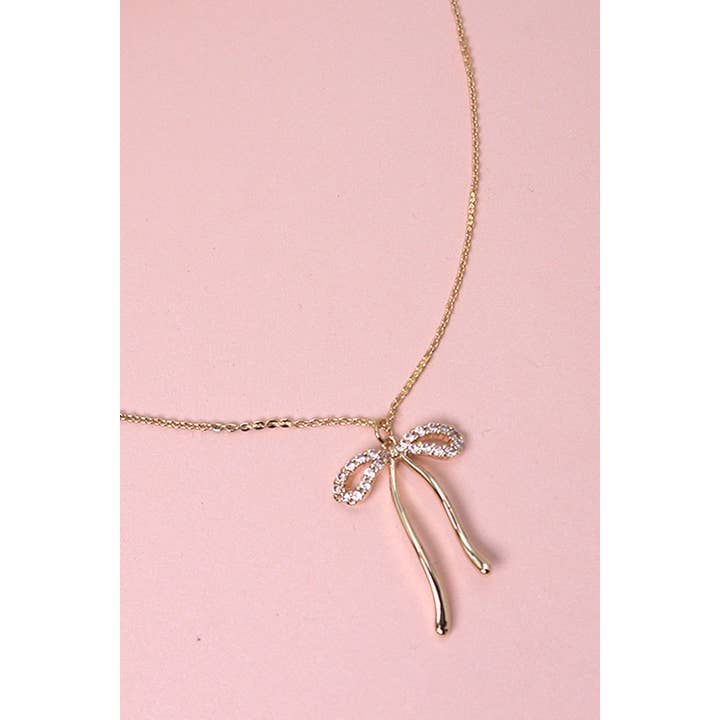 GOLD RHINESTONE BOW PENDANT NECKLACE | 80N358 for wholesale on Faire