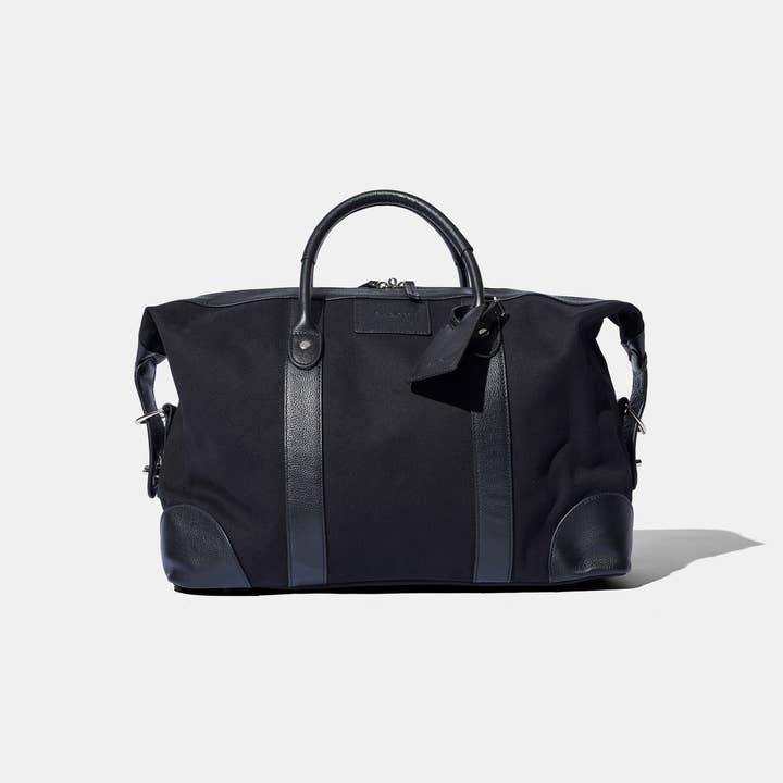 Petit sac week-end en toile noire pour la vente par Baron