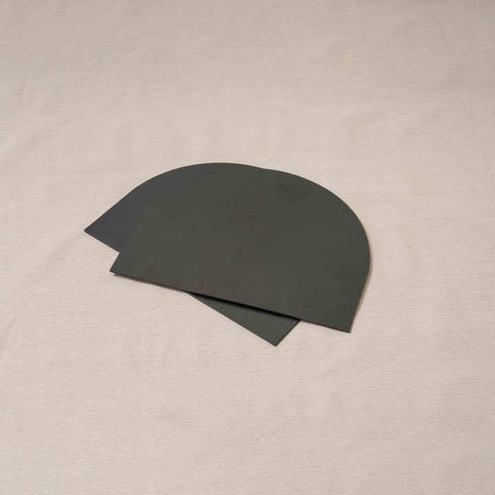 Arch Placemat Pair in black leather for wholesale by Pare