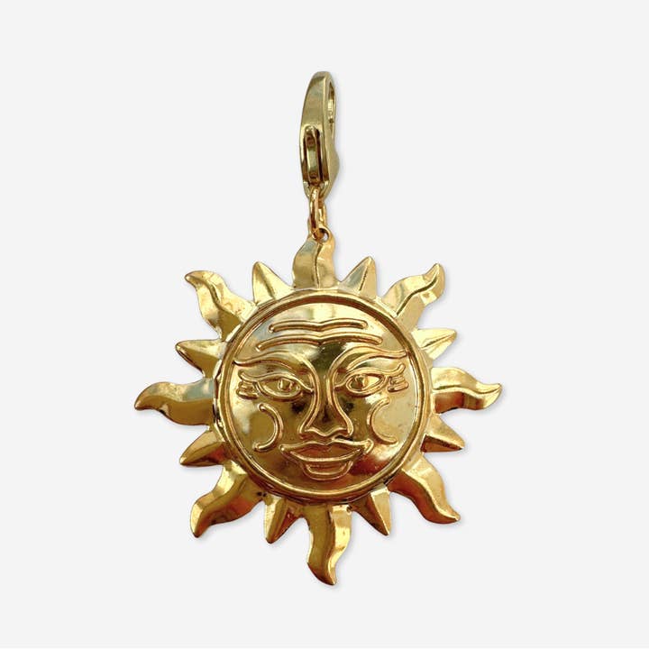 Vintage gold plated stamped sun charm for wholesale by Lulu’s Petals