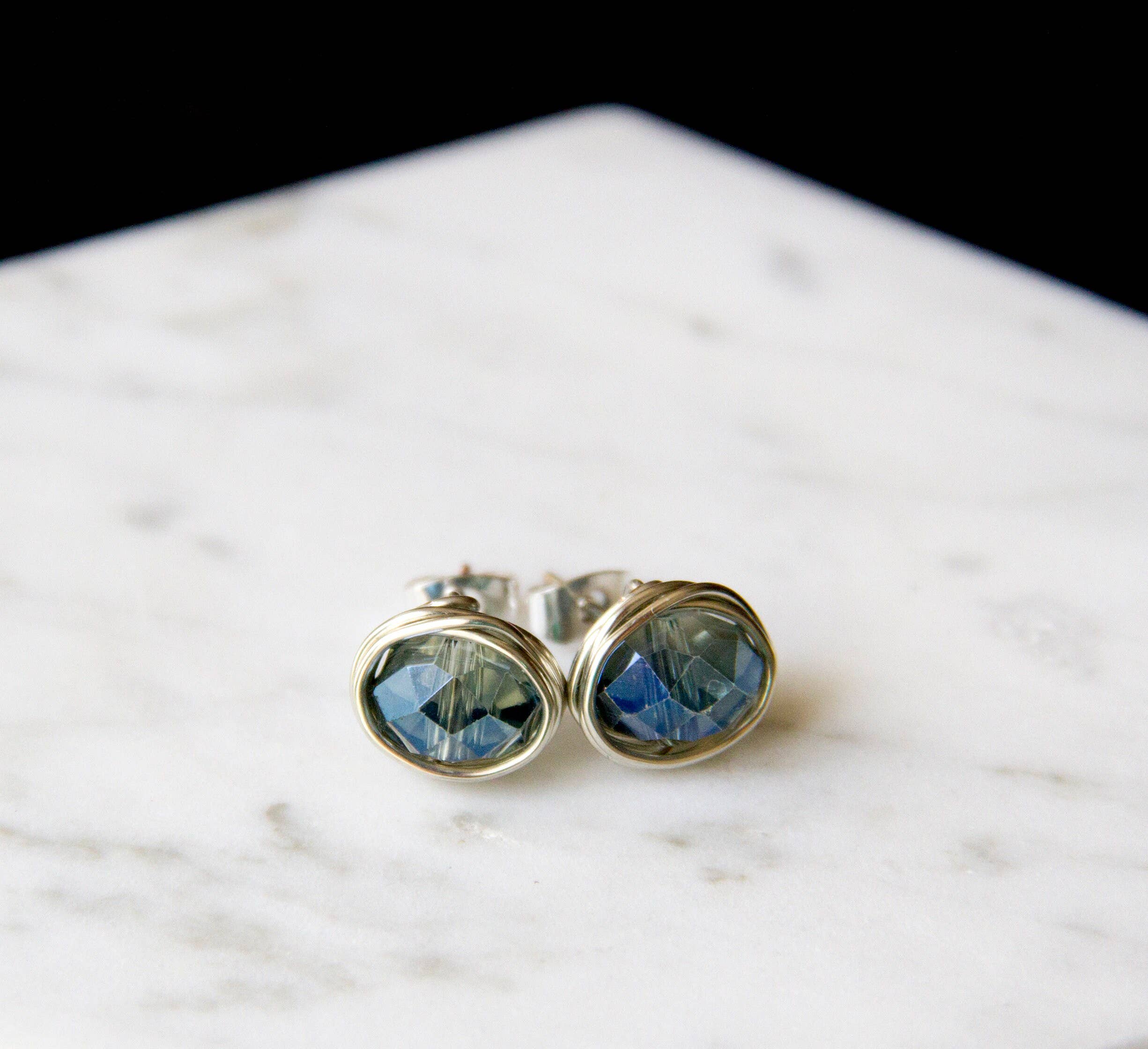 The Jovi Lyne Collection – wholesale Stud/post earrings – Chinese Crystal Stud Earrings Wrapped In Silver - Birthstone - December - Blue1