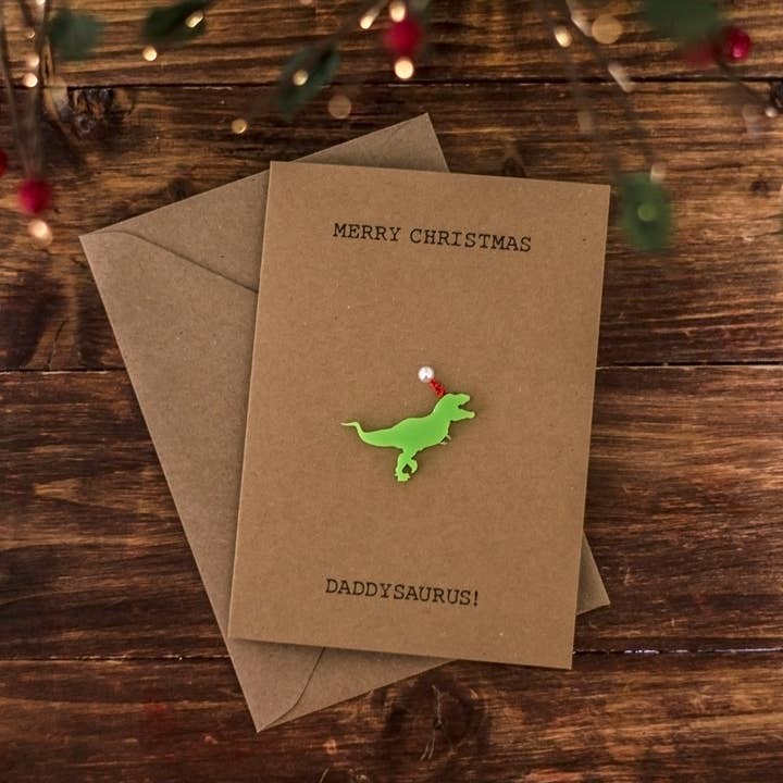 Merry Christmas Daddysaurus / Luxury Xmas Card for Dad for wholesale by Drop Scone Designs