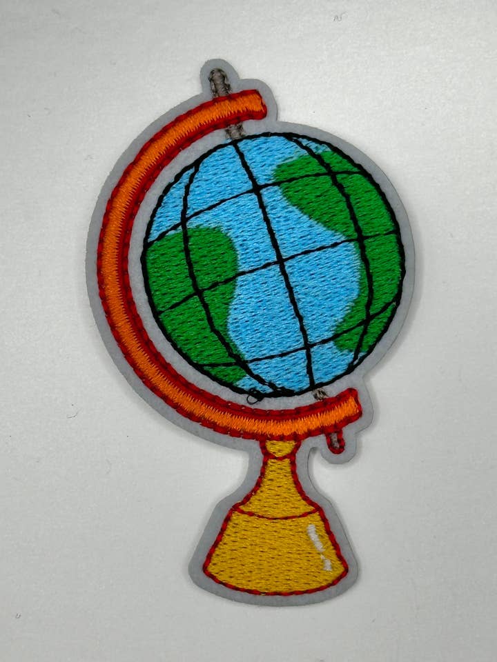 Globe Iron-On Patch for wholesale by Texas Transfers
