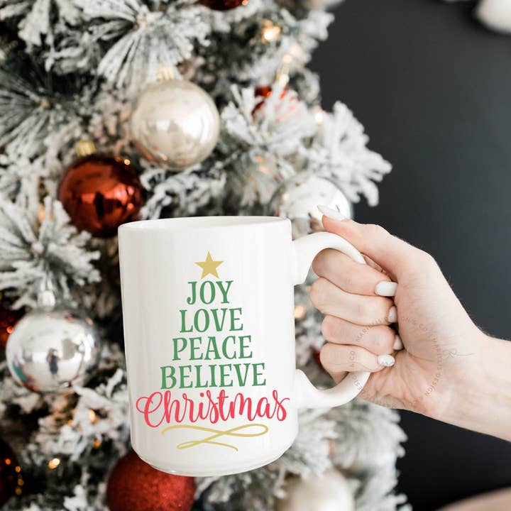 Joy Love Peace Believe Christmas Mug for wholesale by Marielis Design Co