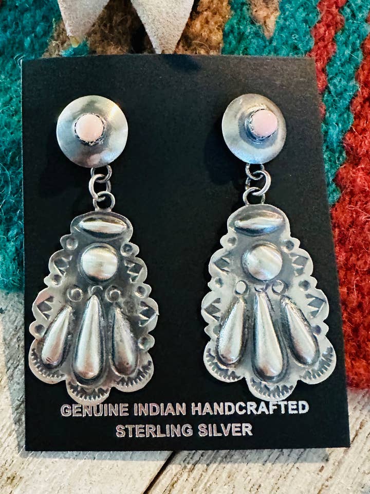 Navajo Queen Pink Conch & Sterling Silver Concho Dangle Earrings for wholesale by Nizhonitradersllc