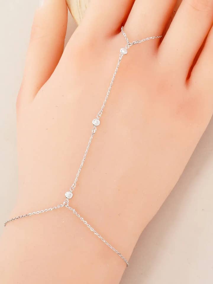 Three Round CZ Accent 18K-Gold-Dipped Delicate Brass Hand-Chain Bracelet for wholesale by Wild Honey