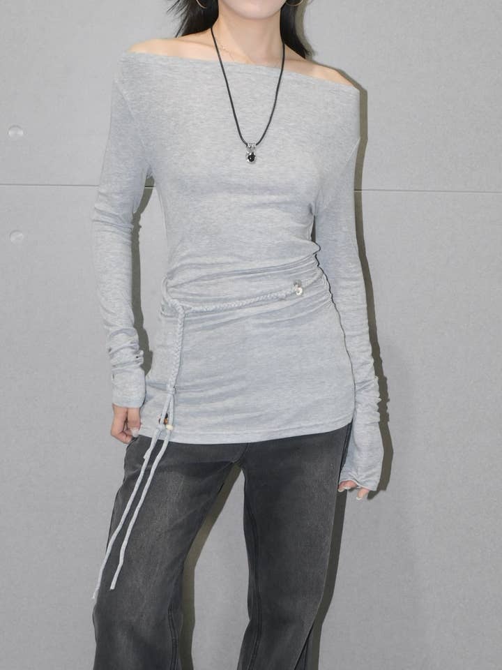 Uldtop med én skulder for engroshandel hos Blanc.Noize