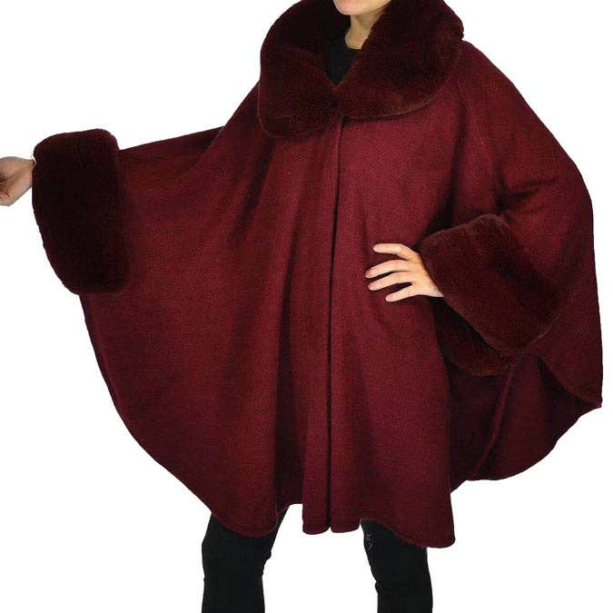Madeline Love - Vendita all'ingrosso Poncho - Donna - Elegante mantello Ruana Poncho lavorato a maglia con polsini in pelliccia sintetica