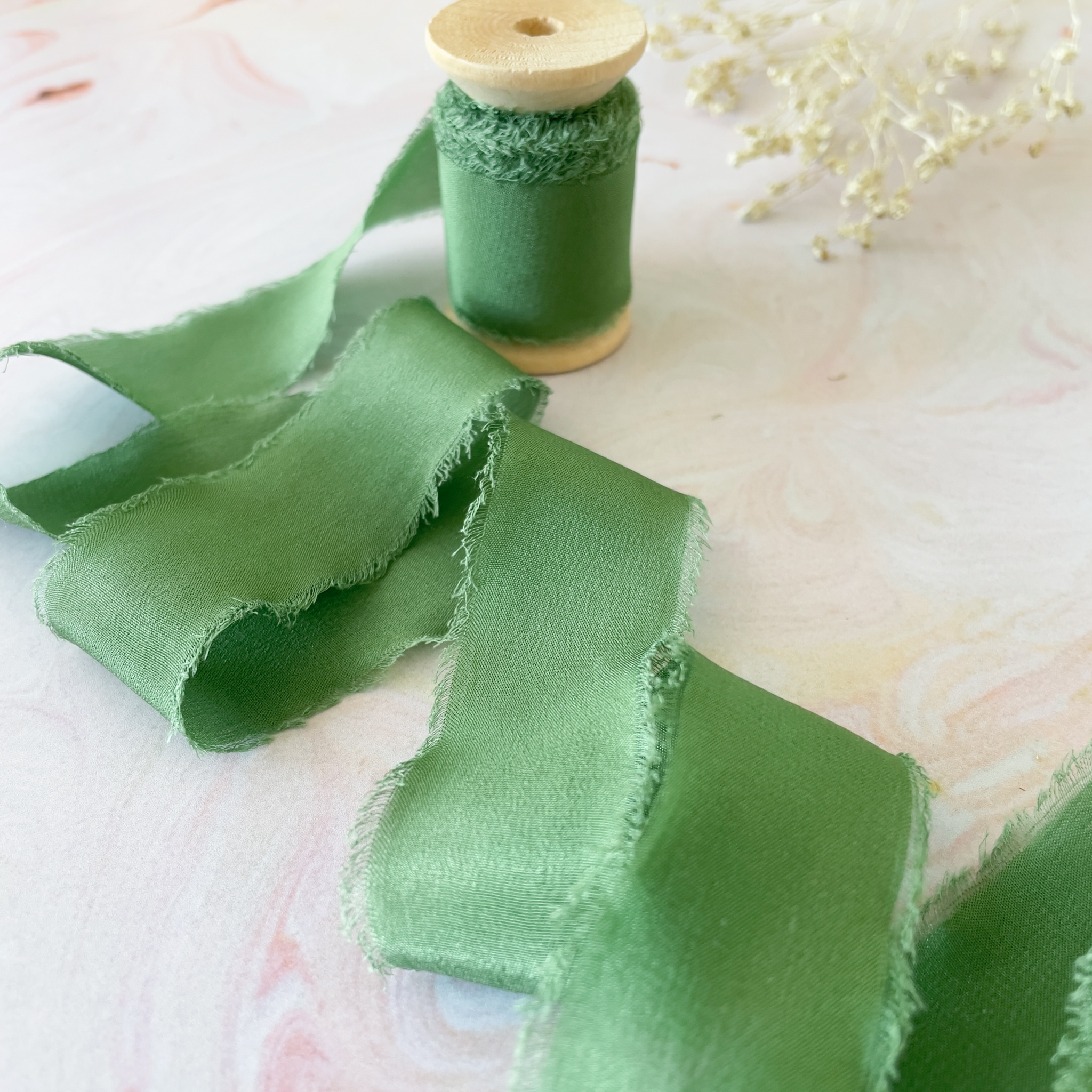 The Natural Paper Company – wholesale Ribbon – Gift wrapping – Emerald Green Silk Ribbon | Raw Edge Silk on a Wooden Reel1