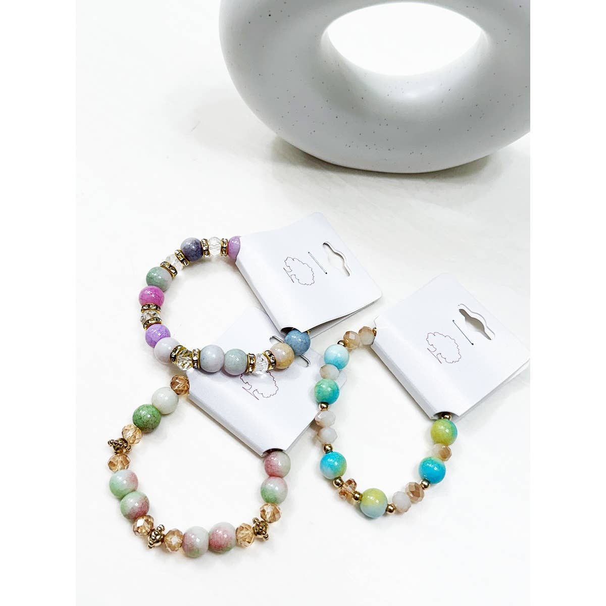 MÉLANGER LA COULEUR Bracelets extensibles en perles mélangées aux teintes douces en vente sur Faire1