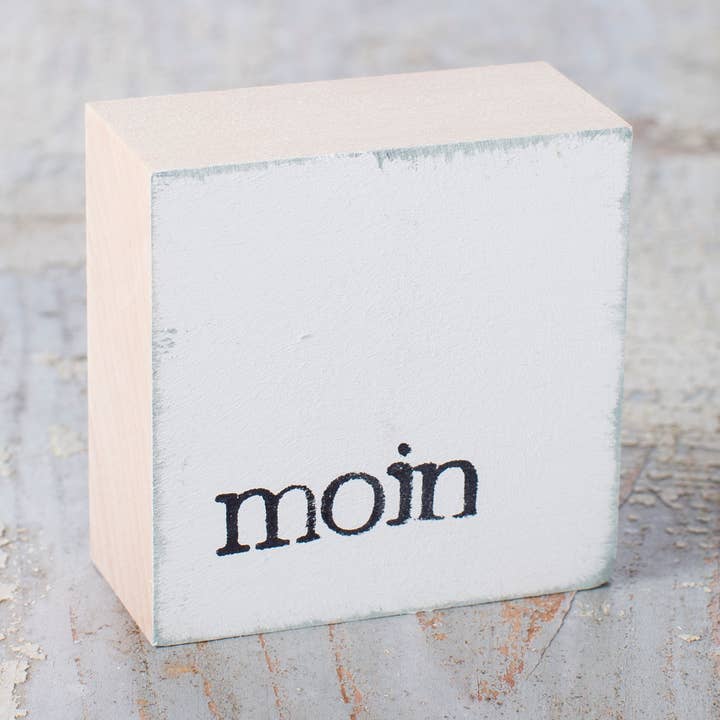 Dekoholzklotz 6x6cm "moin" für den Großhandel von IOPLA