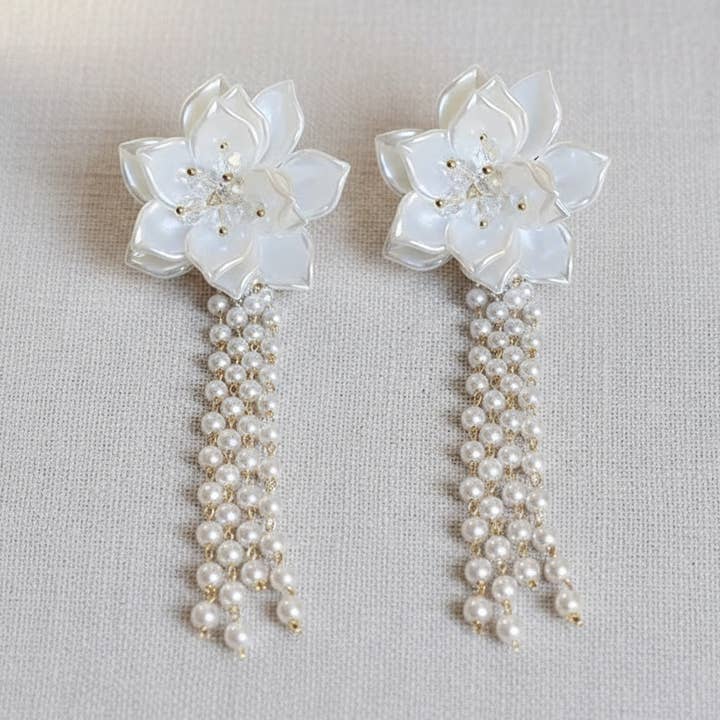Pearl Floral Tassel Earrings for wholesale by camilla dovey
