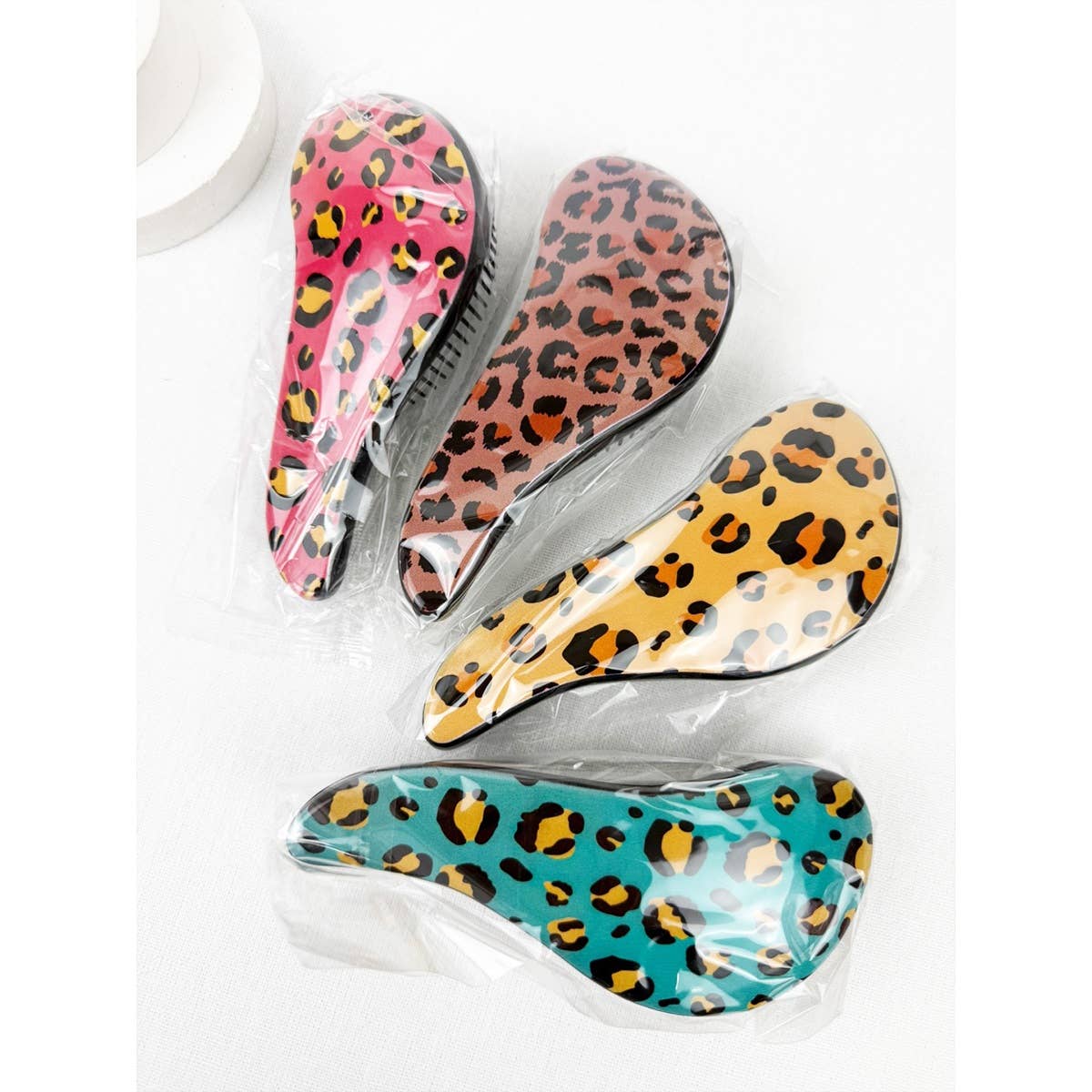 Glide on Easy Grip Leopard Print Hair Brush for wholesale on Faire8