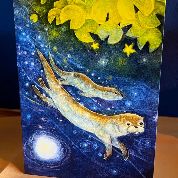 The Otters Play Greetings card for wholesale by Hannah Willow Art