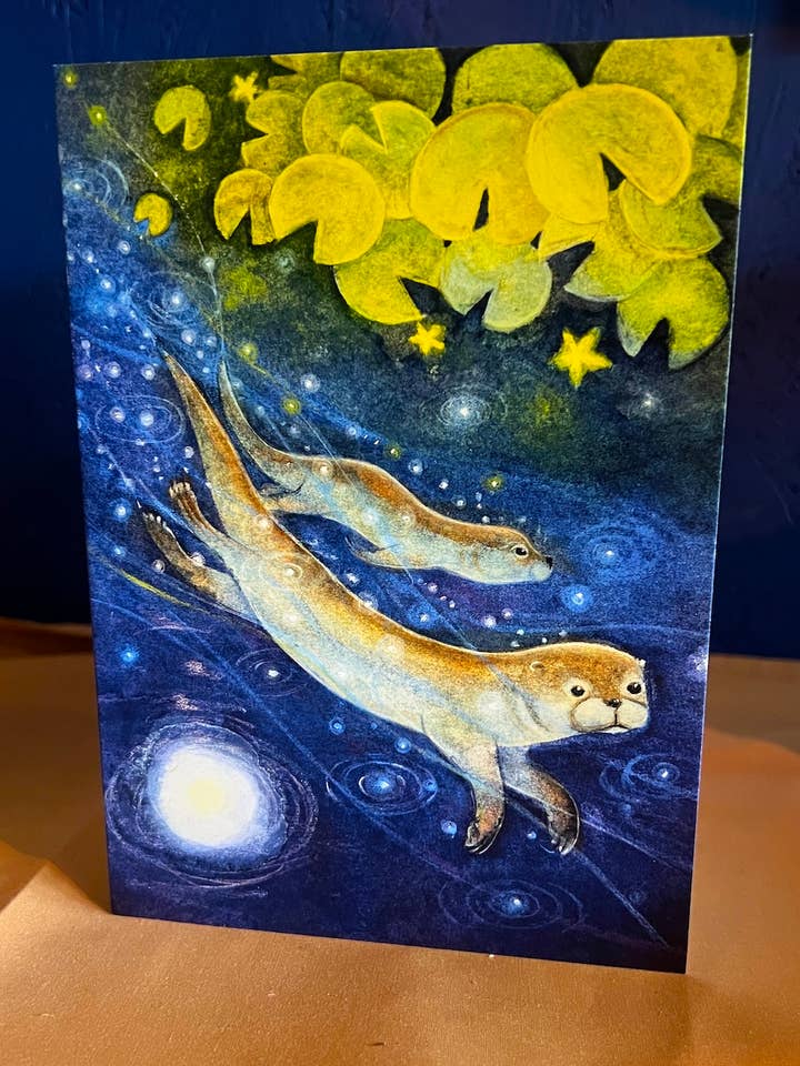 The Otters Play Greetings card for wholesale by Hannah Willow Art