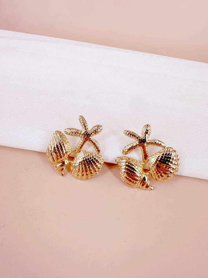 Oorbellen met schelpen van roestvrij staal voor wholesale door D Bijoux