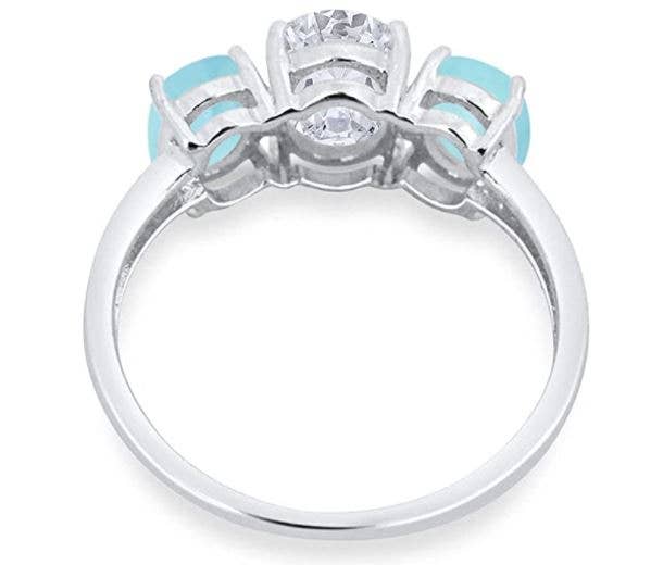 3-Stone Oval Simulated Larimar Center Stone Clear CZ Fashion Ring for wholesale on Faire2