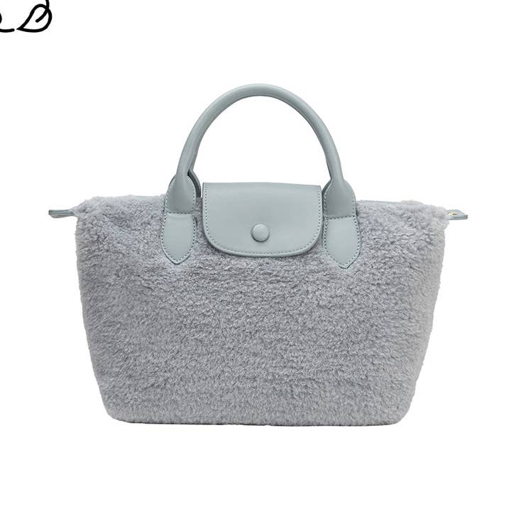 Sac à poignée supérieure Winnie Blue Sherpa pour la vente par Melie Bianco