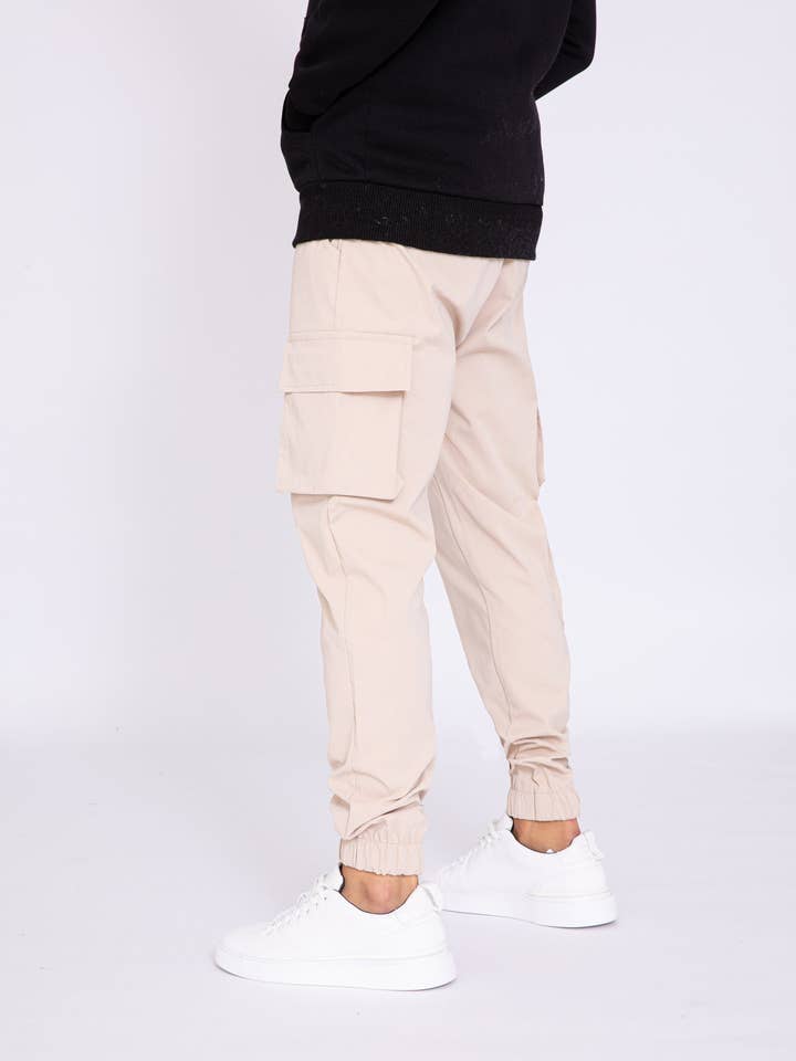 Pantalon Jogging Triple Poches Cargo Avec Zip - Beige pour la vente par AARHON