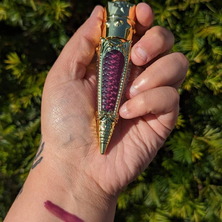 Crypt Cosmetics – wholesale Lip-gloss – JINX - Purple berry, pineapple acai lip gloss