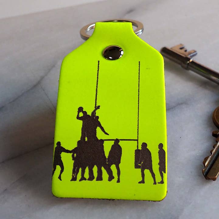 Porte-clés de rugby avec message personnalisé pour la vente par Stabo