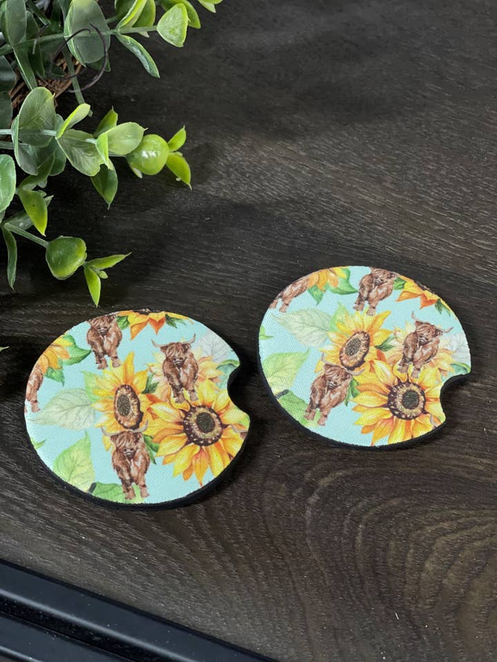 Teal Sunflower Highland Cow Car Coaster Set for wholesale by CMD Wholesale