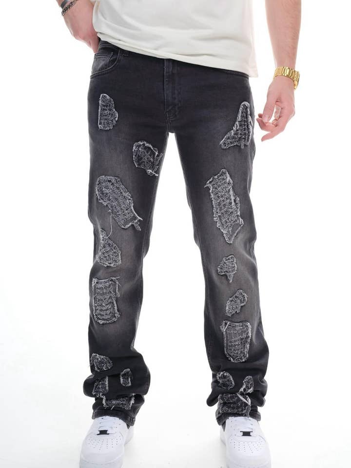 Jeans in denim nero pesante da uomo con dettagli a toppe testurizzate 0824ES3193 per la vendita all'ingrosso da parte di Monocloth