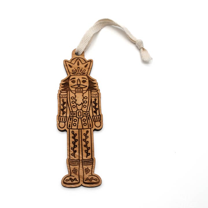 Folk Nutcracker Engraved Wood Ornament for wholesale by Wildewood Handcrafted Goods